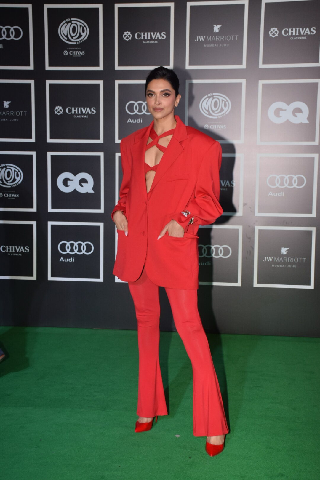 Deepika Padukone or Ranveer Singh: Who wore the red pantsuit better?